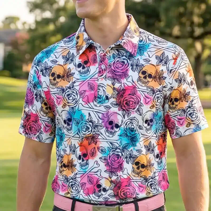 Person wearing a colorful golf shirt with skull and flower pattern