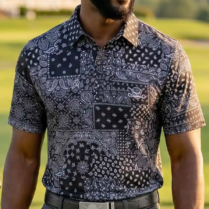 hustler golfer wearing a patterned polo shirt outdoors