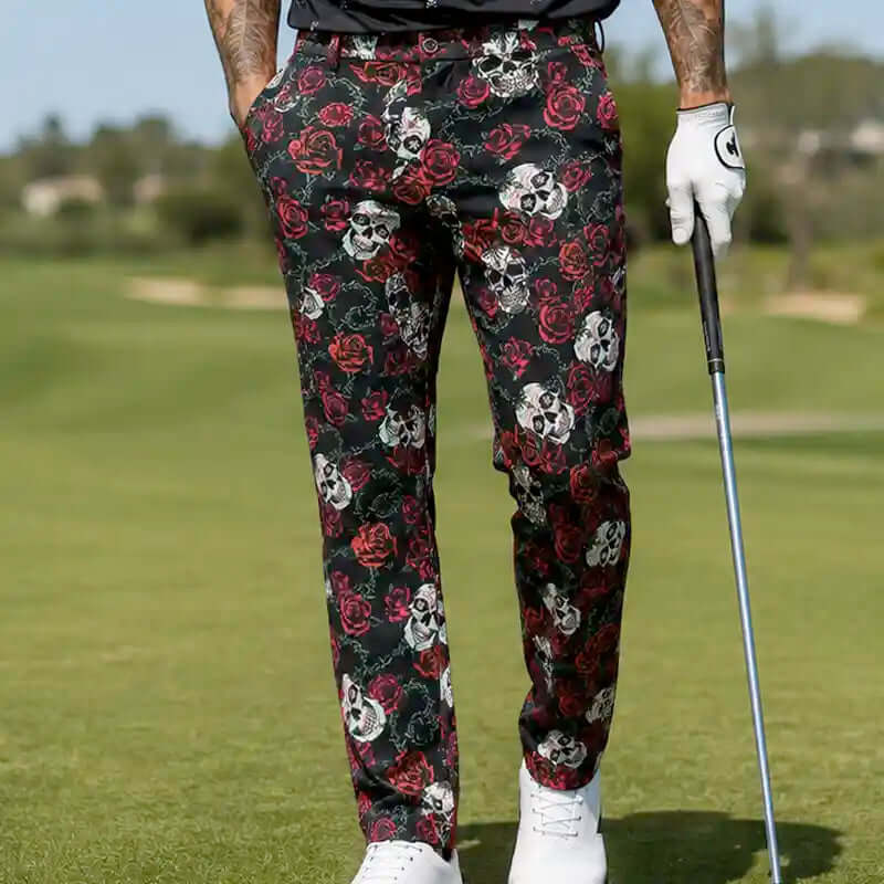 golfer wearing crazy floral and skull patterned golf pants on a golf course