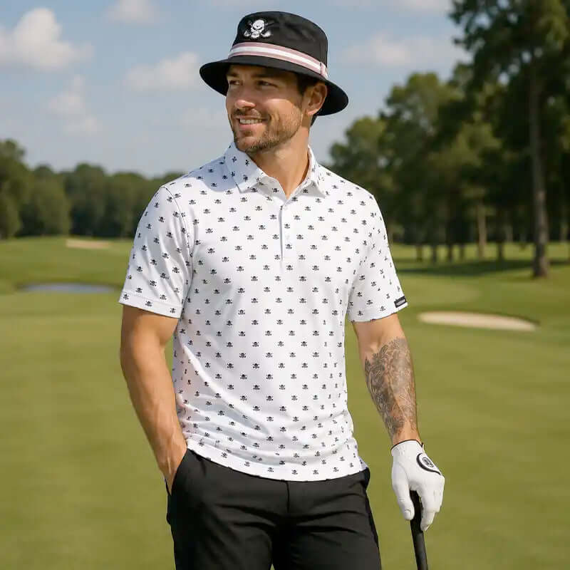 golfer on a golf course wearing a patterned shirt, black pants, and a black bucket hat with a skull design.