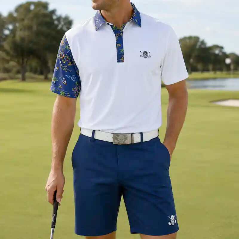 Performance men's white polo golf shirt with blue patterned sleeves and collar, paired with navy golf shorts & premium leather belt