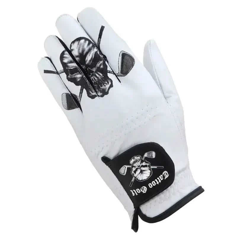 A white Cabretta leather men's golf glove with a skull print design on the back and a TG brand logo on the wrist strap.