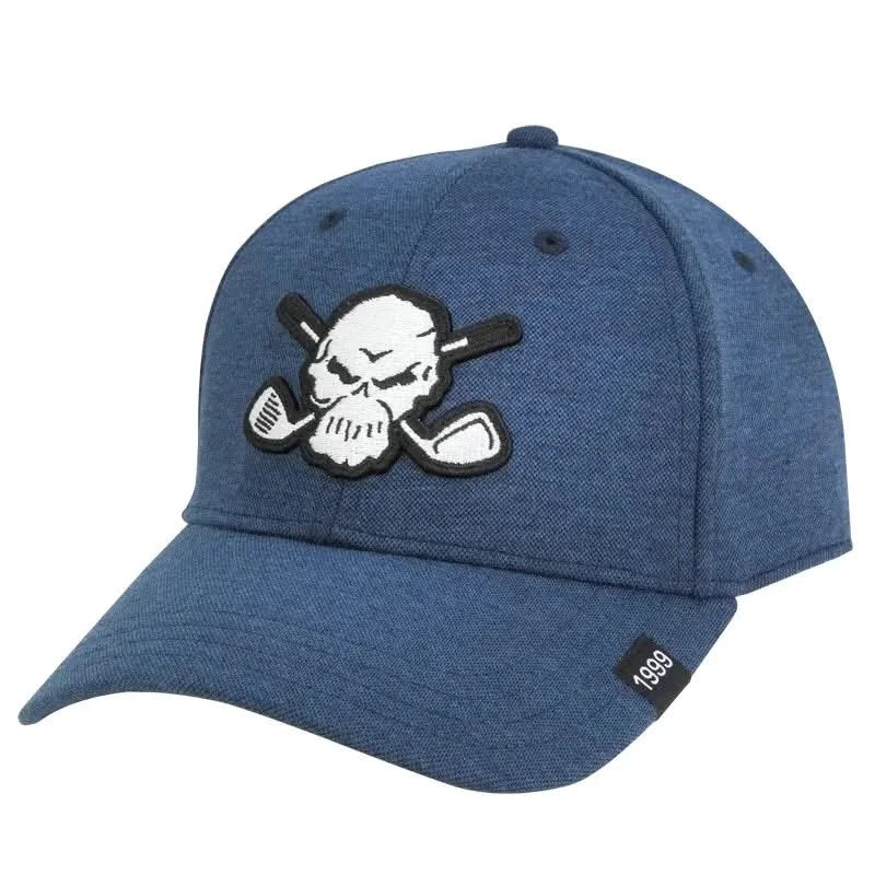 A blue golf hat with a embroidered design of a skull and crossed golf clubs on the front, with a visible brand tag.