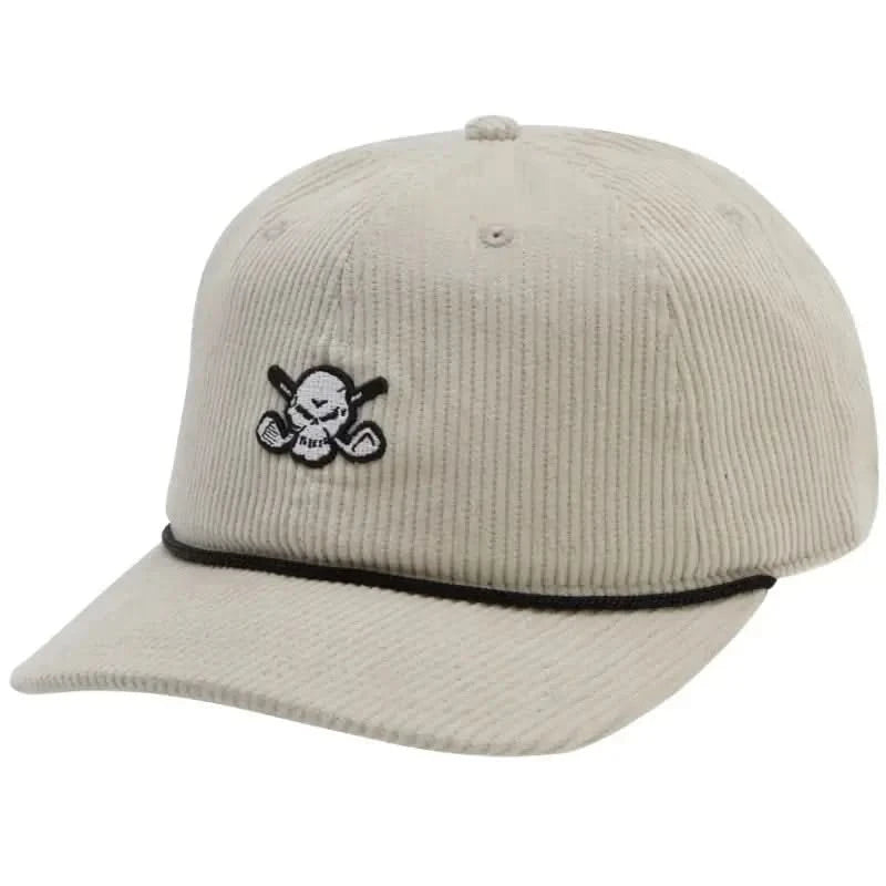 A beige, corduroy golf hat with a black visor and an embroidered design on the front panel.