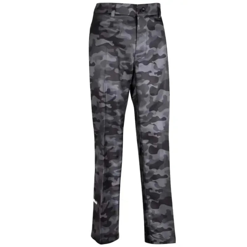 Camo print black golf pants with embroidered skulls and crossing golf clubs design on the lower left side.