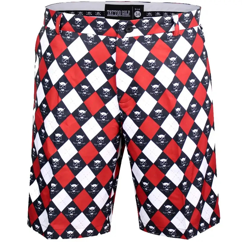 A pair of men's golf shorts with a red, black, and white checkered pattern and skull designs. The shorts have a tailored fit with a self-fabric waistband featuring a skull design.