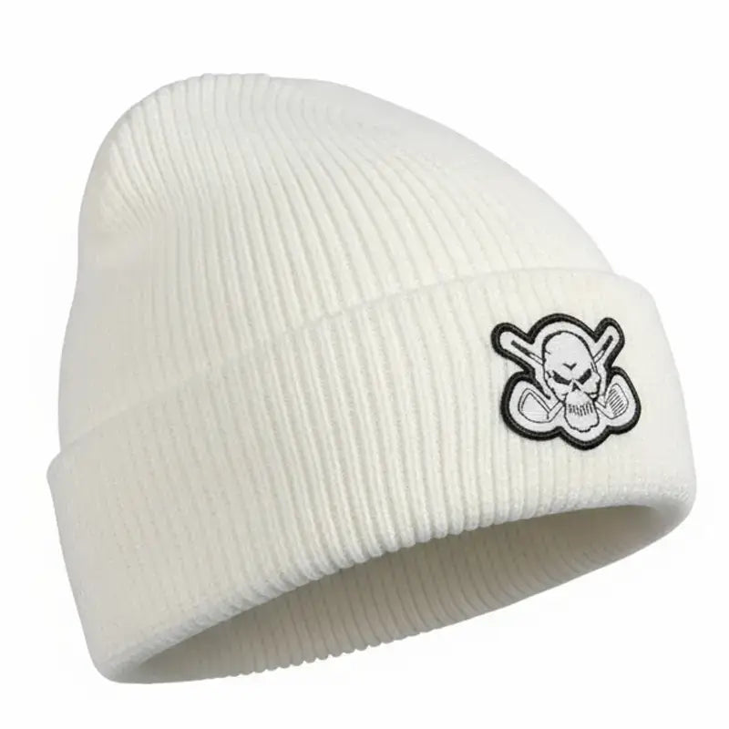 White golf beanie with a skull and crossbones logo