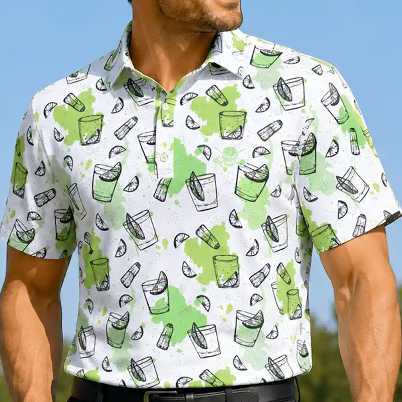 Man wearing a white shirt with green and black pattern against a blue sky.