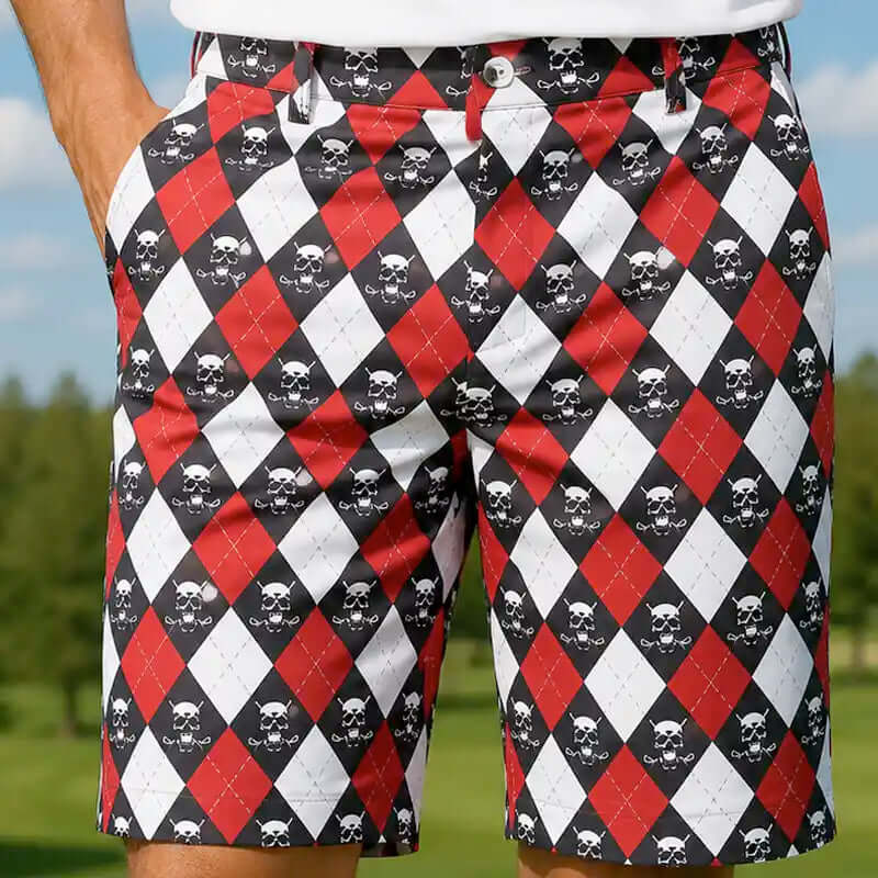 Golf Shorts with a red, black, and white argyle pattern featuring small skulls