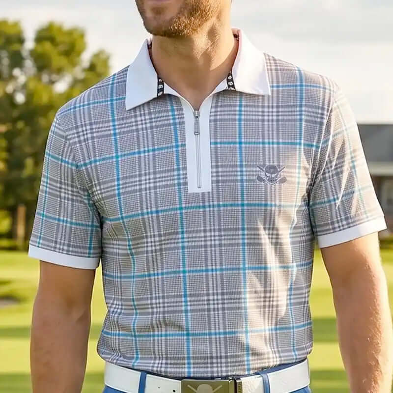 golfer wearing a plaid blue polo shirt on a golf course