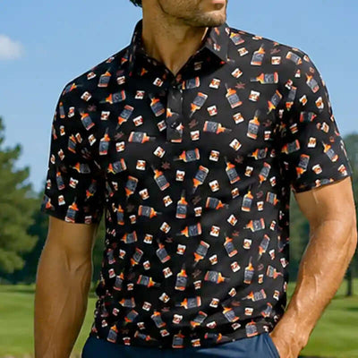 Man wearing a black whiskey patterned shirt on a golf course