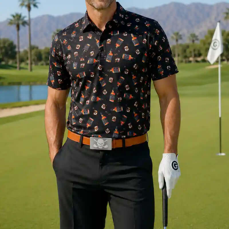 Man in a whiskey bottle patterned golf shirt and black pants 