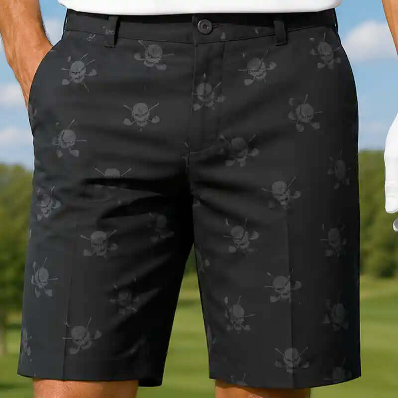 Black shorts for men with skull pattern worn by a golfer on a golf course