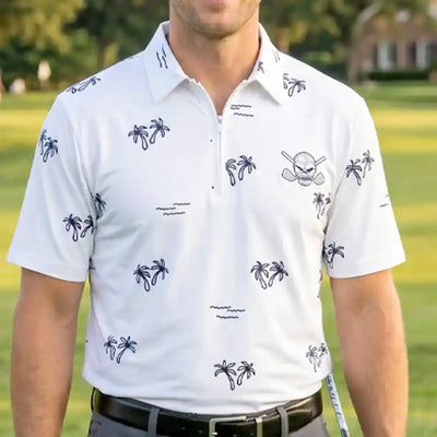 golfer wearing a white polo shirt with black patterns on a golf course