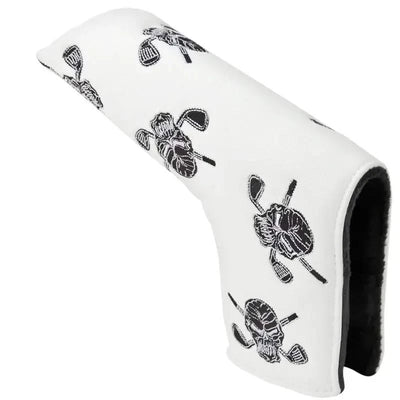 A white putter cover with an embroidered skull and crossed golf clubs design, featuring a black magnetic closure at the bottom.