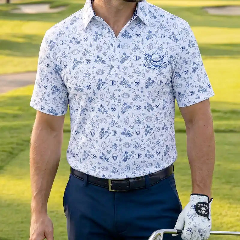golfer wearing a flash patterned shirt and golf glove on a golf course