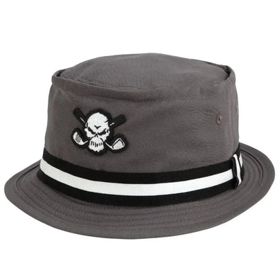 Angled front view of the charcoal Tattoo Golf Premium Bucket golf hat with a skull-and-crossed-clubs patch and black-and-white band.