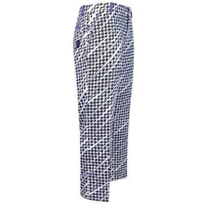 Tattoo Golf Houndstooth ProCool golf pants in black, white and purple, full-length side view.