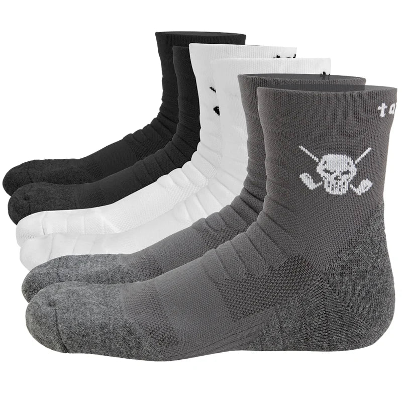 Three pairs of athletic socks with a skull and crossed clubs design on the instep, available in black, white, and gray colors.