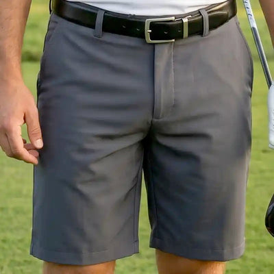 Tattoo Golf OB Cool-Stretch golf shorts in charcoal, front view worn by a golfer on the course.