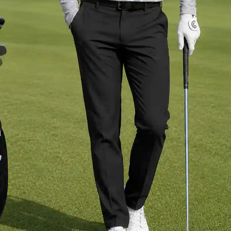 man wearing black golf pants, best golf pants for men