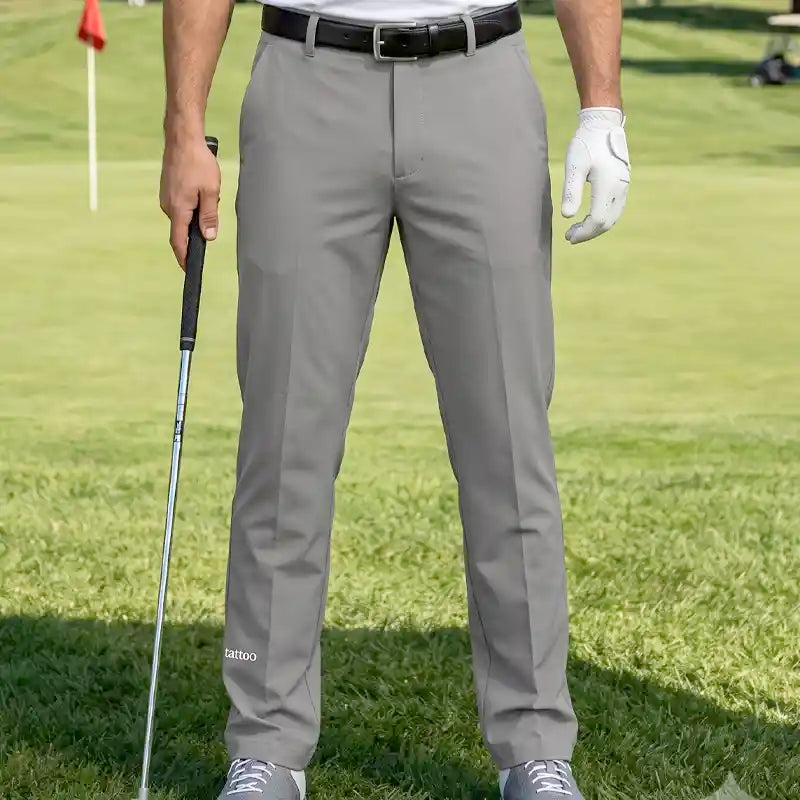 golfer wearing cool gray golf pants on a golf course