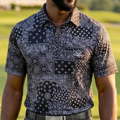 hustler golfer wearing a patterned polo shirt outdoors