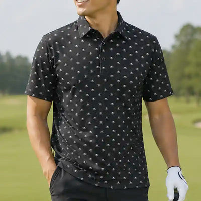 Tattoo Golf Micro Skull men's polo in black, worn on a golf course with the skull pattern visible.