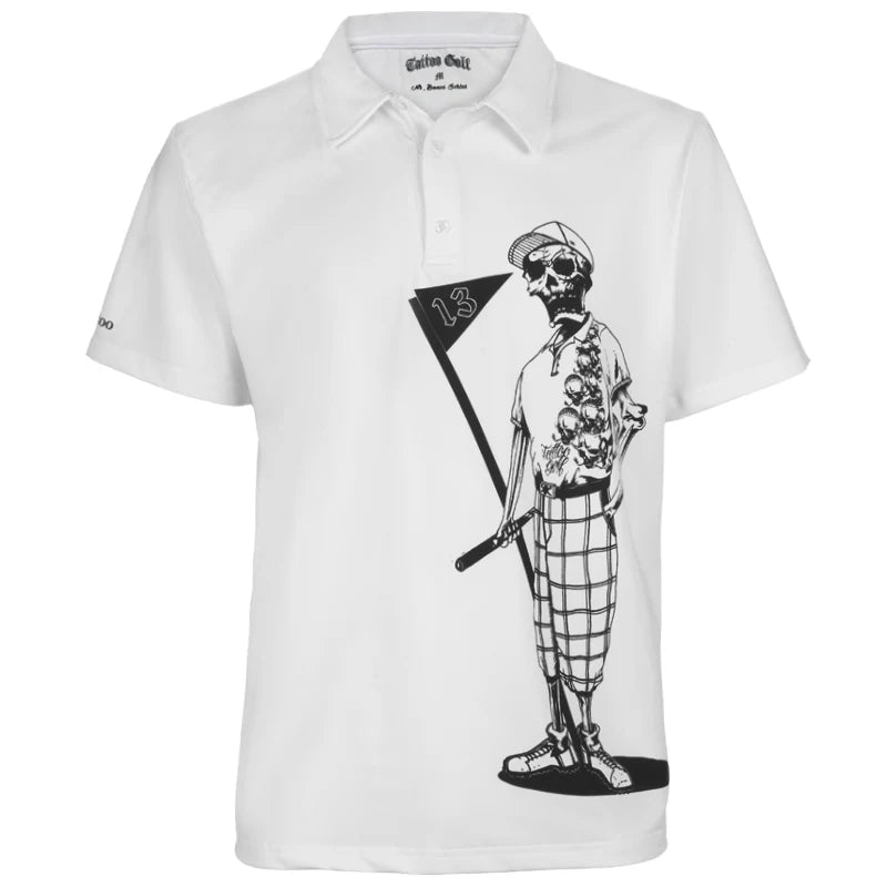 A white polo shirt with a graphic of a skeleton golfer on it, featuring a black and checkered patterned hat and a flag.