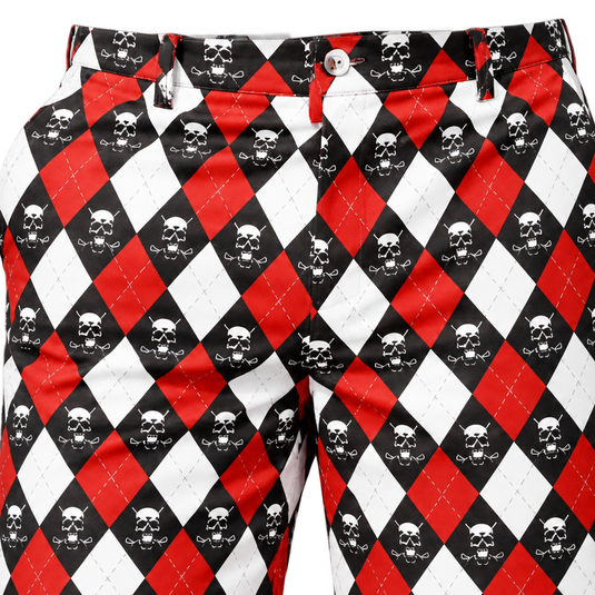 Close-up of the button waist, front fly and skull-patterned argyle fabric on red, white and black golf shorts.