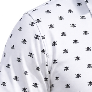 Detail of the shoulder seam and skull pattern on a white polo.