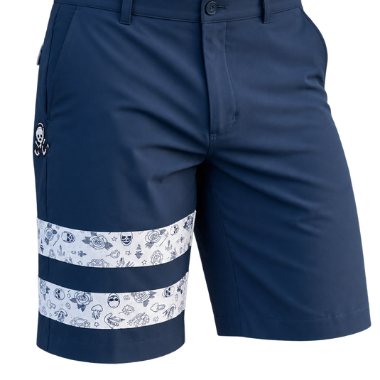 Close-up front view of navy golf shorts with two white patterned leg bands.