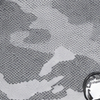 Close-up of grey camouflage fabric with part of a skull logo at the edge.