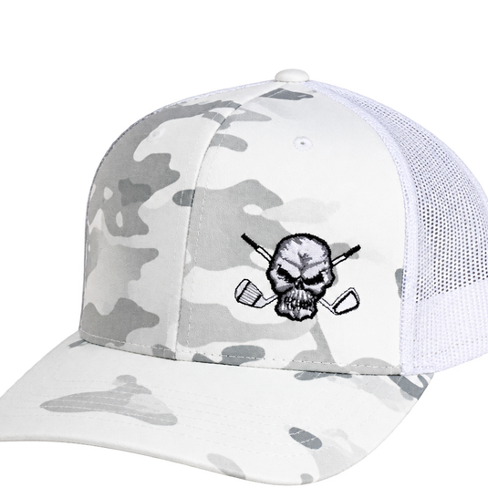 Close-up of a white camouflage cap's crown, brim and skull logo.
