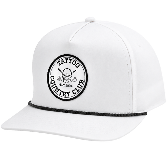 Angled close-up of a white Tattoo Country Club rope cap.