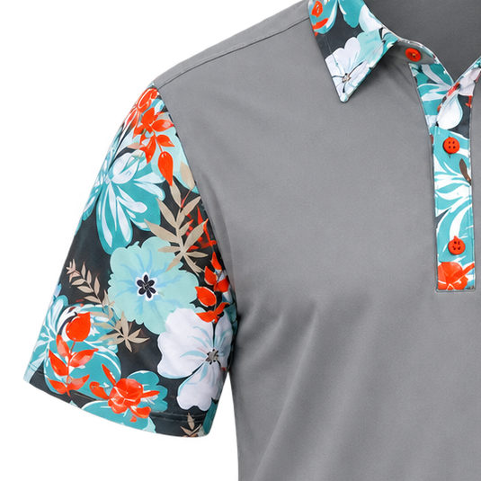 Close-up of the floral right sleeve, shoulder seam and collar on a grey VIP polo.
