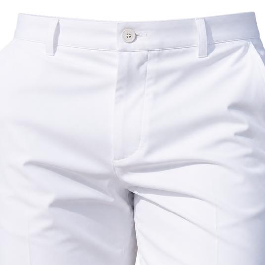 Close-up of white golf shorts showing the waistband button, belt loops and front fly.
