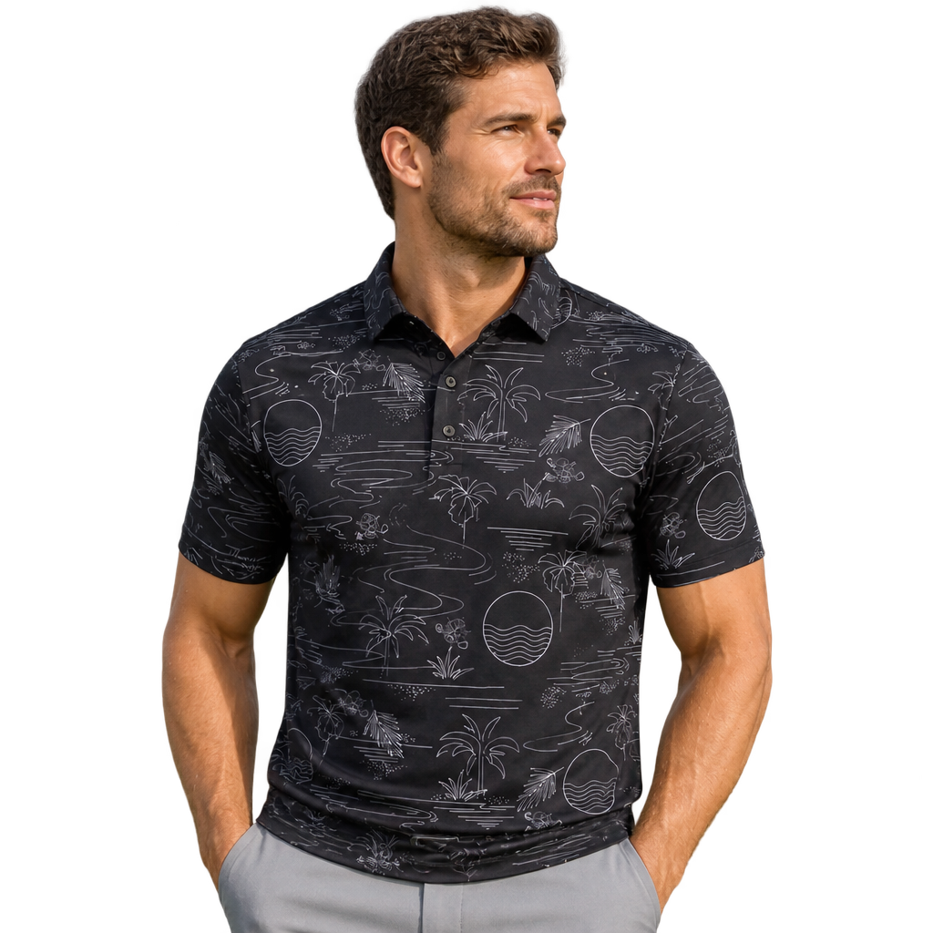 Man wearing a black golf polo with a subtle grey tropical line-art print, paired with light grey trousers.
