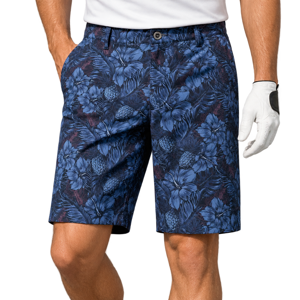 Golfer wearing blue tropical-floral shorts with a white polo and white glove.