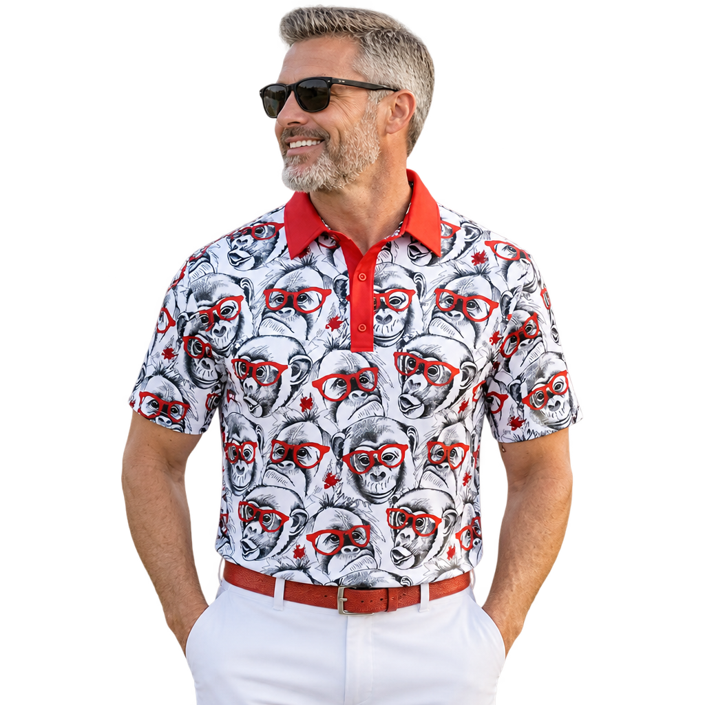 Man wearing a white monkey-print polo with a red collar, white trousers and red belt.