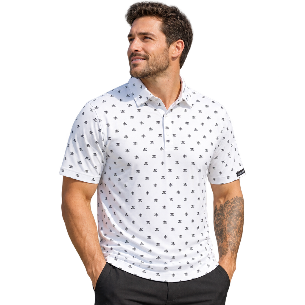 Man wearing a white polo with small black skull motifs.