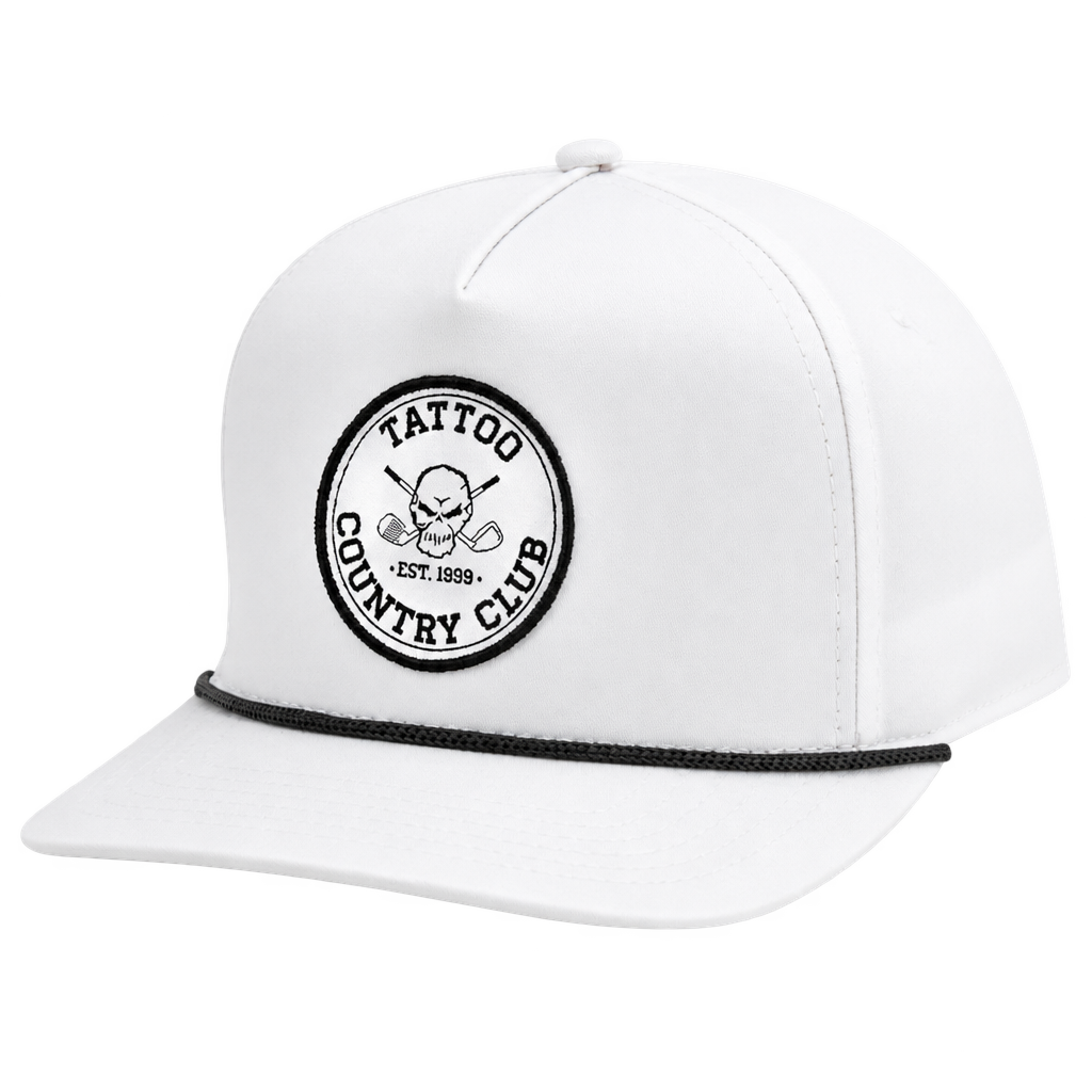 White rope-trim golf cap with a circular Tattoo Country Club skull patch.