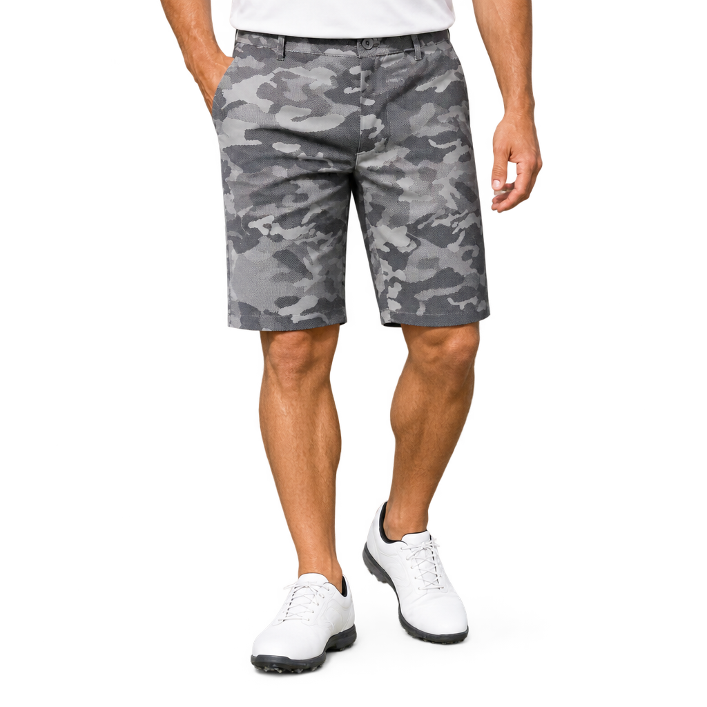 Man wearing grey camouflage golf shorts, a white polo and white golf shoes.