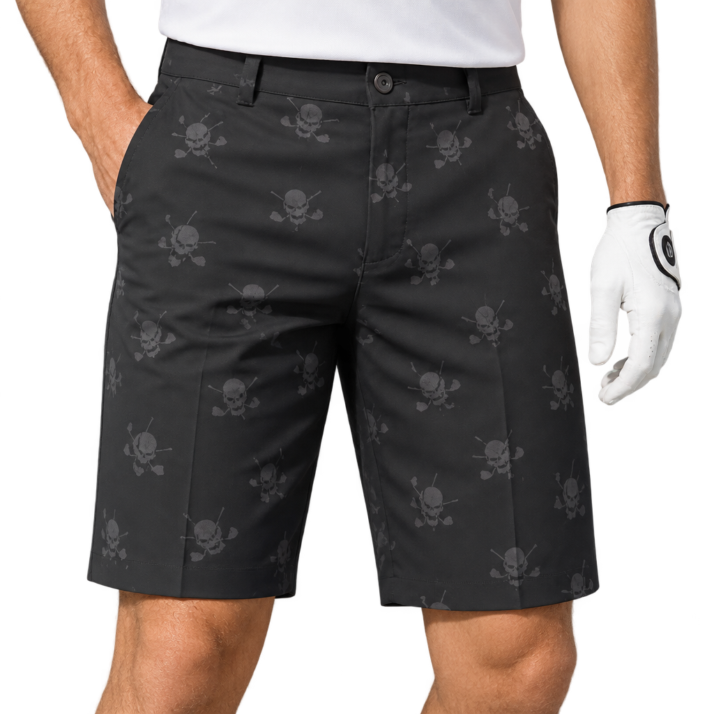 Golfer wearing black shorts patterned with small grey skull-and-crossed-clubs motifs.
