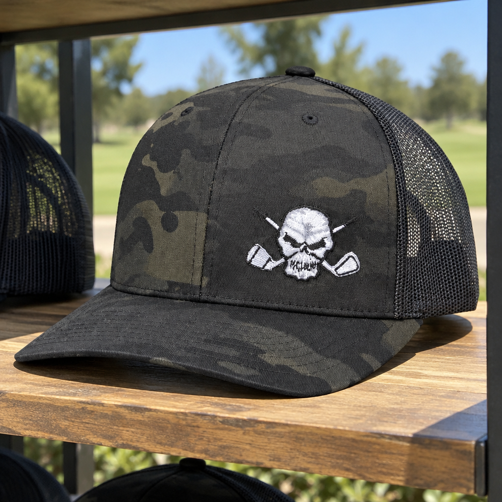 Dark camouflage skull-logo trucker cap resting on a wooden shelf.