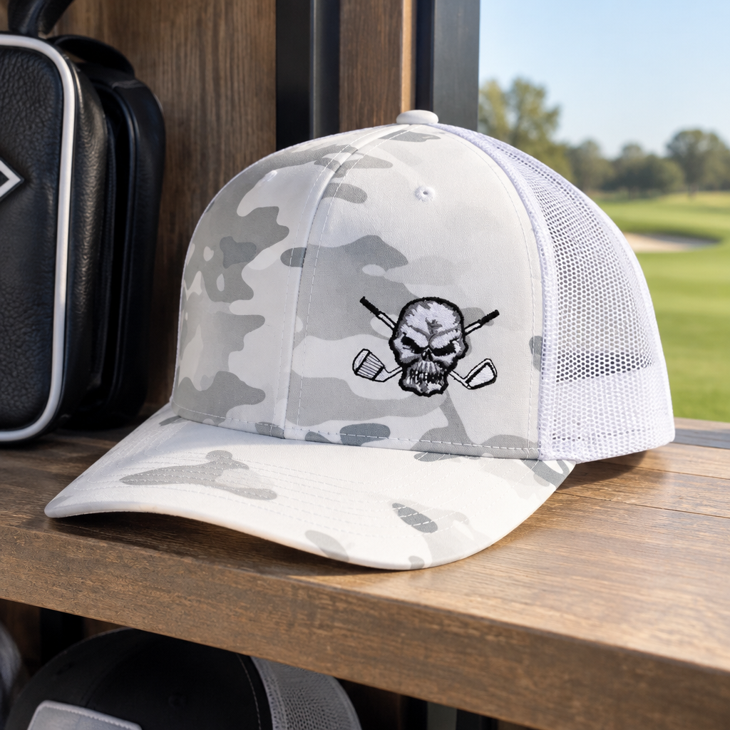 White camouflage skull-logo cap resting on a wooden shelf.