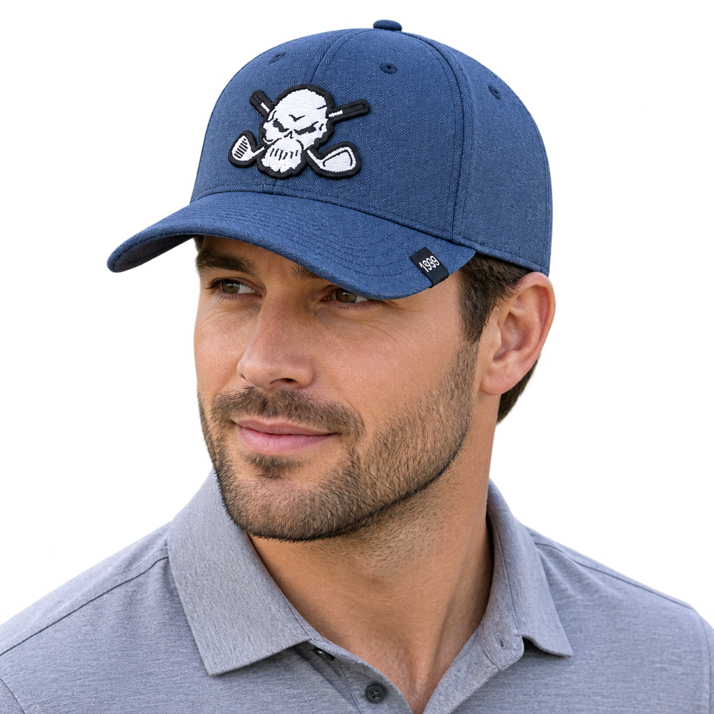 Man wearing a blue cap with a white skull-and-crossed-clubs patch.