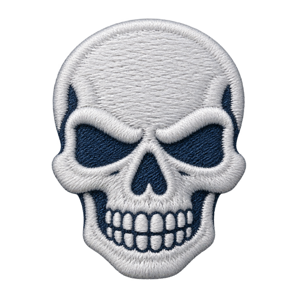 White embroidered-style skull illustration with navy eye sockets.