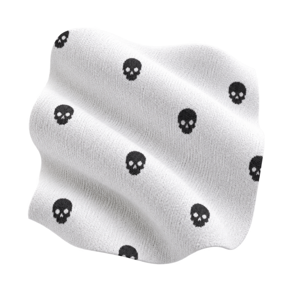 Illustration of white fabric with small black skulls.