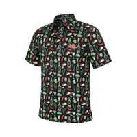 Angled view of a black golf polo with an all-over print of tacos, drinks and colorful food-themed graphics.